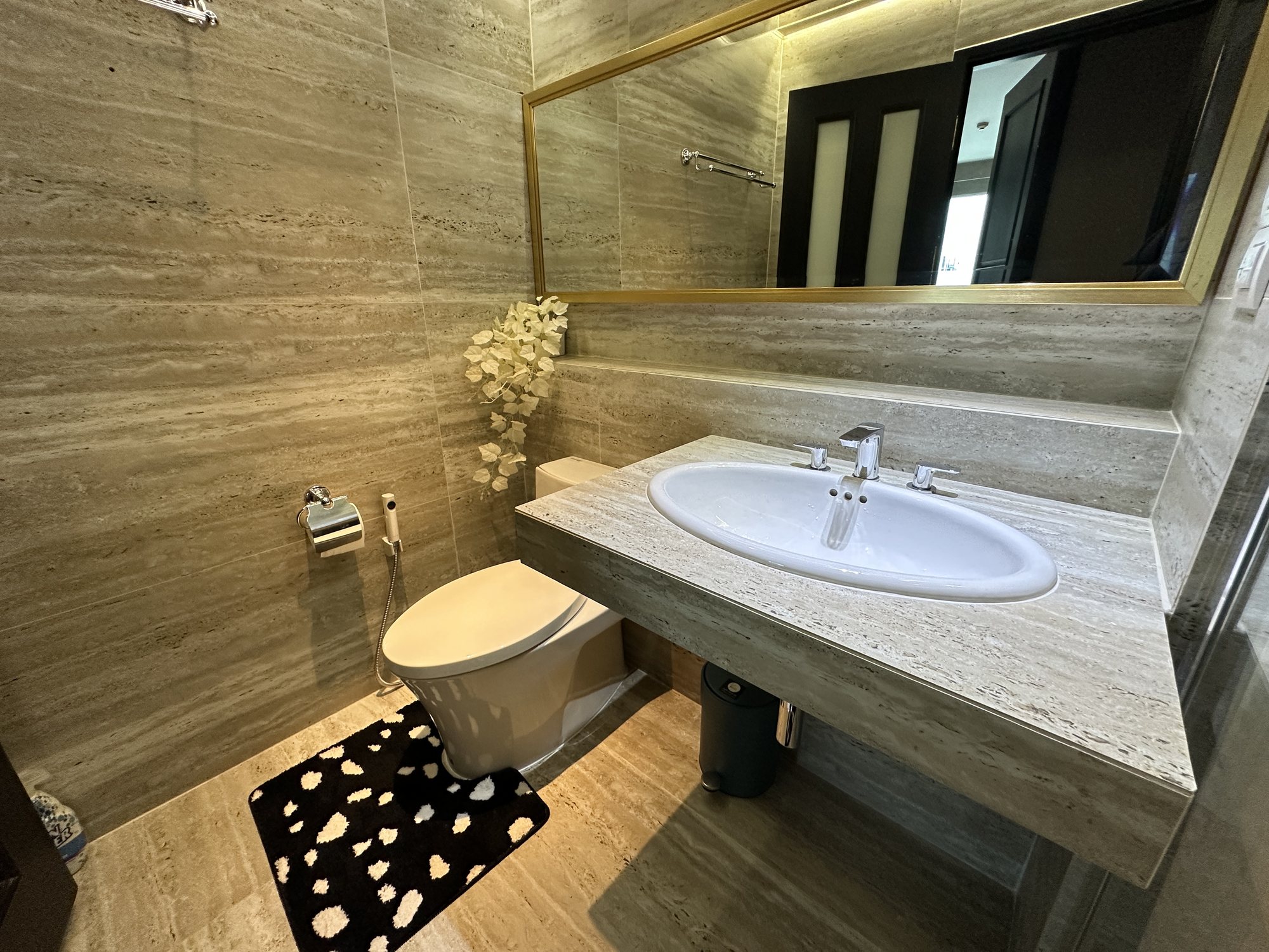 Travertine stone bathroom with walk-in shower